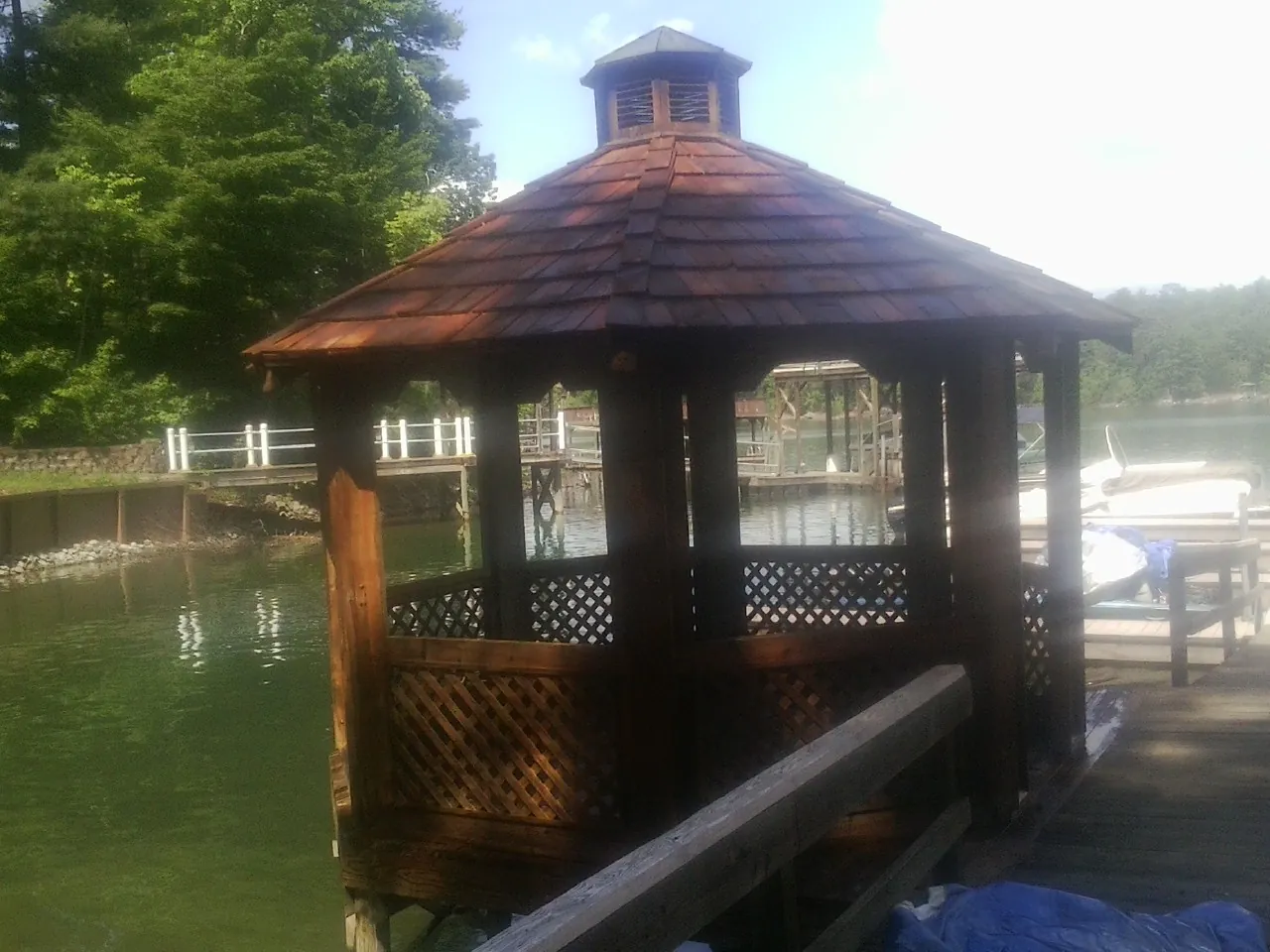 Cedar shake gazebo roof rebuilt on a lake dock in Sauquoit